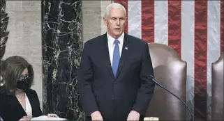  ?? J. Scott Applewhite Associated Press ?? VICE PRESIDENT
Mike Pence after working all night to certify the 2020 vote on Jan. 7, 2021.