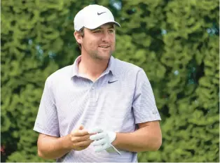  ?? JOHN MINCHILLO/AP ?? Masters champion Scottie Scheffler, ranked No. 1 in the world, returns to the Travelers Championsh­ip at TPC River Highlands in Cromwell.