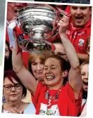  ??  ?? Joy: Cork skipper Rena Buckley lifts the O’Duffy Cup