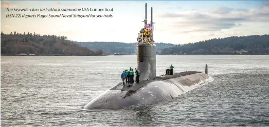  ??  ?? The Seawolf- class fast- attack submarine USS Connecticu­t (SSN 22) departs Puget Sound Naval Shipyard for sea trials.