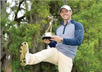  ?? — USA Today Sports ?? Rory Mcilroy celebrates winning the Players Championsh­ip at TPC Sawgrass — Stadium Course.