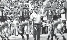  ?? PERRY MCINTYRE JR./GEORGIA PHOTO ?? Georgia assistant football coach Sam Pittman saw his offensive line struggle for much of last Saturday’s 26-24 win over Nicholls State.