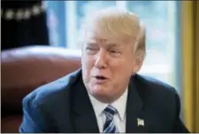  ?? ANDREW HARNIK - THE ASSOCIATED PRESS ?? In this April 19 photo, President Donald Trump speaks in the Oval Office in Washington. With a budget deadline looming, President Donald Trump plans a whirlwind of activities seeking to highlight accomplish­ments while putting fresh pressure on...