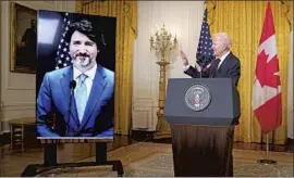  ?? EVAN VUCCI Associated Press ?? PRESIDENT BIDEN greets Canadian Prime Minister Justin Trudeau. On the agenda for Tuesday’s meeting were COVID-19 and climate and economic issues.