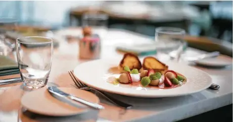  ?? Marie D. De Jesús photos / Houston Chronicle ?? Lucienne serves foie gras mousse with strawberry rhubarb, coconut and brioche.