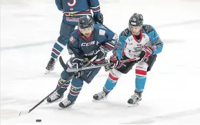  ??  ?? Stars’ Vinny Scarsella tussles with Belfast Giants’ Matt Towe. Scarsella’s input will be vital for Stars at the weekend.