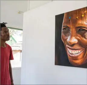  ?? ?? Smile: One of Wilson Ngoni’s brilliant paintings