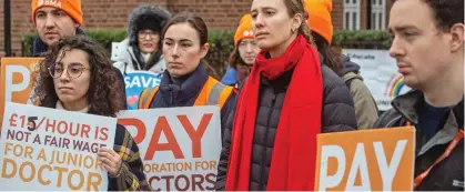  ?? ?? Latest dispute: Junior doctors on the picket line outside Homerton Hospital in east London