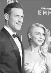  ?? Richard Shotwell Invision/AP ?? BROOKS LAICH and wife Julianne Hough arrive at the Creative Arts Emmy Awards this month.