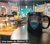  ??  ?? Une tasse de District 31