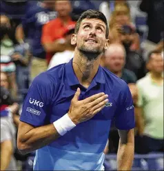  ?? FRANK FRANKLIN II/ASSOCIATED PRESS ?? Top-ranked Novak Djokovic reacts after defeating Matteo Berrettini in four sets in a match that ended early Thursday, sending him to the semifinals of the U.S. Open in New York.