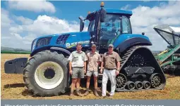  ?? FOTO’S: VERSKAF ?? Wonderlike werktuig: Saam met mnr. Reinhardt Grobler (regs) van BR Dienste Bethlehem, die New Holland-handelaar, is mnre. Paul de Wet (links), eienaar van die trekker, en sy seun Tiaan.