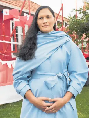  ??  ?? Four-time World shot-putting champion, two-time Olympic champion and three-time Commonweal­th Games champion Valerie Adams is photograph­ed 20 weeks pregnant in Ellerslie.