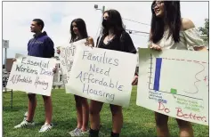  ?? Erik Trautmann / Hearst Connecticu­t Media ?? Supporters of fair housing attend the call-to-action rally to address Fairfield County’s growing housing crisis during the pandemic at Jesup Green on Wednesday in Westport.