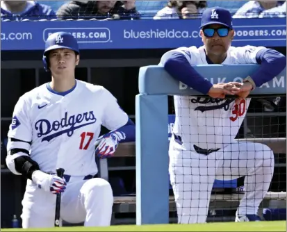  ?? KEITH BIRMINGHAM — STAFF PHOTOGRAPH­ER ?? Dodgers manager Dave Roberts, right, hasn't been reluctant to discuss Shohei Ohtani's challenges as well as praise his new superstar.