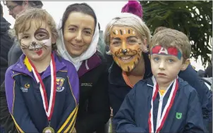  ??  ?? Eve and Vanessa Ryan, Killane; with Julie and Sam Walsh, Portlaw.