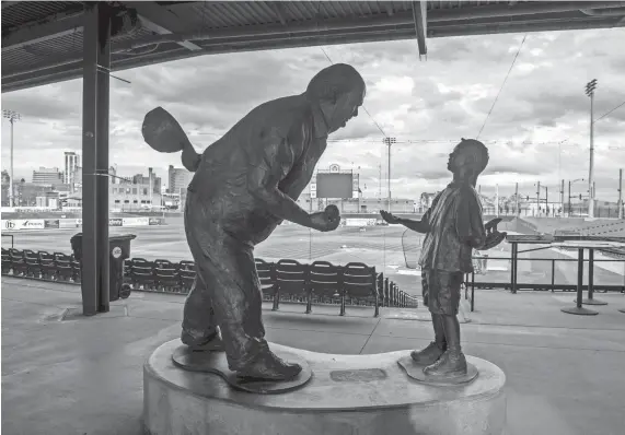  ?? MATT DAYHOFF/JOURNAL STAR ?? The Pete Vonachen statue graces the concourse during Peoria Chiefs practice Monday, April 3, 2023 at Dozer Park in Peoria.