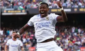  ?? Albert Gea/Reuters ?? David Alaba’s first-half winner at Camp Nou sent Real Madrid top of La Liga. Photograph: