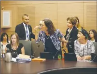  ?? (Marc Israel Sellem/The Jerusalem Post) ?? USHERS REMOVE Kulanu MK Rachel Azaria from yesterday’s hearing of the Knesset Interior Committee due to her fierce opposition to parts of the government mikve bill she says will damage women’s rights.