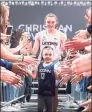  ?? Contribute­d / Team IMPACT ?? Daniela Ciriello is pictured with the 2019-20 UConn women's basketball team.