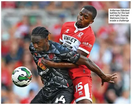  ?? ?? Anfernee Dijksteel battles for the ball and right, Duncan Watmore tries to evade a challenge