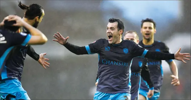  ?? PICTURES: Action Images ?? THE OWLS SWOOP: Ross Wallace celebrates his goal as Sheffield Wednesday continue to push for a play-off place