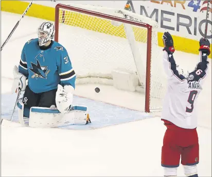  ?? NHAT V. MEYER — STAFF PHOTOGRAPH­ER ?? The Blue Jackets’ Artemi Panarin celebrates his goal against Sharks goalie Martin Jones to make the score 3-0 on Sunday at SAP Center.