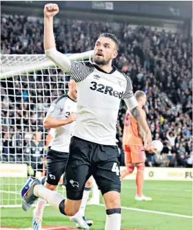  ??  ?? Quick off mark: Scott Malone celebrates his early opening goal for Derby County