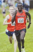  ?? StaFF pHOtOS by NICOLauS CZarNeCKI ?? AND THE WINNERS ARE: Providence College junior Abbey Wheeler breezed to victory in the women’s race at the Coast-to-Coast Battle in Beantown cross country meet yesterday at Franklin Park, while the men’s race was much closer — where Amon Kemboi of Campbell University held off Syracuse’s Aidan Tooker for the win.