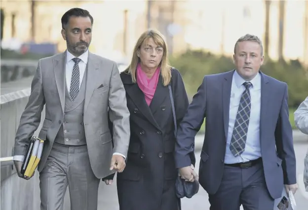  ??  ?? 0 The family of Katie Allan, mother Linda and father Stuart, accompany their lawyer Aamer Anwar yesterday for a meeting with Justice Secretary Humza Yousaf