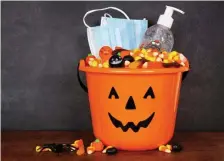  ?? TNs ?? BE SAFE: A few extra precaution­s, like masks and frequent hand-washing, should help keep children too young to be vaccinated safe this Halloween.