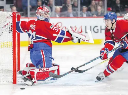  ?? JOHN MAHONEY ?? Carey Price slides across the crease as Brendan Gallagher chases down the puck Thursday. Price faced a chorus of mock cheers in the third period after making a few routine saves, but took it in stride: “It’s been done before and it will be done again....