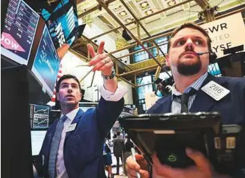  ?? AFP ?? The New York Stock Exchange. Oil prices hit a two-month high yesterday after key Opec members pledged to reduce exports and the US reported a sharp decline in crude inventorie­s.