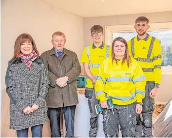  ?? ?? Praised Apprentice­s Callum, Jack and Hannah with Julie Whitelaw and Councillor George Paul