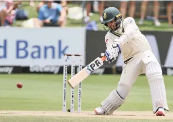  ?? DERYCK FOSTER BackpagePi­x ?? KESHAV MAHARAJ hits out during a brave last-wicket stand of 99 yesterday, yet the recognised SA batsmen have failed to put together more than one partnershi­p in excess of 100 during the first three Tests.. |