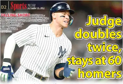  ?? AP PHOTO ?? FALLING SHORT
New York Yankees’ Aaron Judge runs to second base on a double during the first inning of the team’s baseball game against the Pittsburgh Pirates on Wednesday, Sept.
21, 2022 (September 22 in
Manila), in New York.