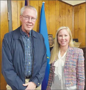  ?? PDN photo by David Seeley ?? Poteau First Baptist Church Pastor Troy George, left, shares a moment with Poteau Public Schools Board of Education President Ranada Adams after Monday night’s meeting in which George was appointed to fill the vacant seat that was left vacated when former board member Matt McBee left his district.