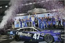  ?? JOHN ROUAX — THE ASSOCIATED PRESS ?? Ricky Stenhouse Jr. celebrates in Victory Lane after winning the Daytona 500 Sunday night.