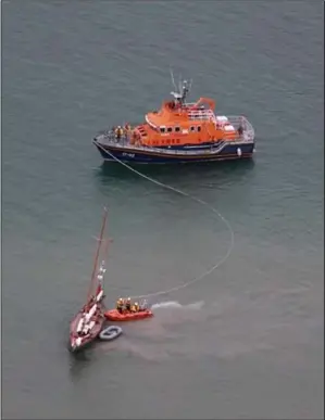  ??  ?? Rosslare and Wexford lifeboats come to the assistance of the yacht which ran aground off Wexford Harbour.