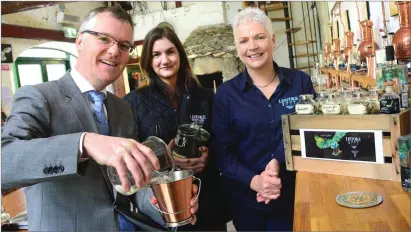  ??  ?? Thomas McEvoy, Head of Enterprise in Louth is pictured here announcing the LEO Louth 2016 results with Bronagh Conlon and Juliet Gogan of Listoke Distillery at their Gin School outside Drogheda.