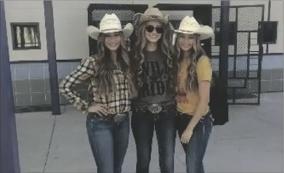  ?? PHOTO JENESSIS MADRIGAL ?? Southwest High School students pose wearing their cowboy hats for Western Wednesday.