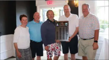  ??  ?? Above, Team Sessler took first place at the Mike Martin Memorial Golf Tournament on Monday, June 17, 2019. Mary Catherine Martin stands with Team Sessler, made up of Eric Burrell, Pat Vogel, Robert Tenney and Jim Sessler.