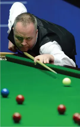  ?? Photograph: PA ?? John Higgins marches into the final with a 17-8 win