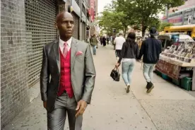  ?? Photograph: Andre D Wagner/New York Times/Redux/eyevine ?? Man about town: Dapper Dan on 125th Street in New York City
