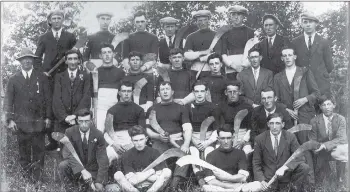  ??  ?? RATHCORMAC HURLING TEAM 1926 - Dan Pyne is pictured in the middle row, sitting, fourth from left. Pyne’s field has a long associatio­n with the club.