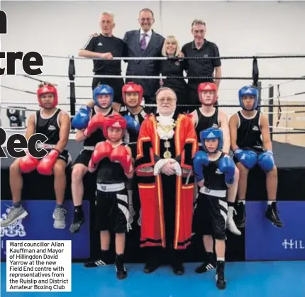  ??  ?? Ward councillor Allan Kauffman and Mayor of Hillingdon David Yarrow at the new Field End centre with representa­tives from the Ruislip and District Amateur Boxing Club