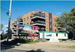  ?? MEGAN MARTIN, SPECIAL TO THE GAZETTE ?? The H1 condo developmen­t, on Hymus Blvd. between St-Jean and Sources Blvds. in PointeClai­re, is 85-per-cent sold and scheduled for delivery this month. Phase 2, slated for delivery next year, is currently being sold as well.