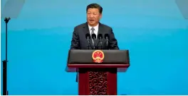  ?? — AFP ?? (Above) China’s President Xi Jinping speaks during the opening ceremony of Brics Business Forum at the Xiamen Internatio­nal Conference and Exhibition Centre in Fujian province, China, on Sunday. (Right) Russian President Vladimir Putin arrives to...