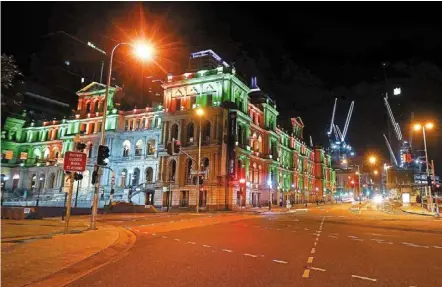  ?? — AFP ?? Deserted again: The streets are empty in central Brisbane, Australia, after the city and other parts of Queensland state were placed under a snap Covid-19 lockdown on Saturday.