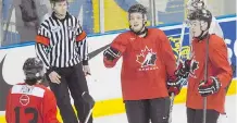  ?? CHRIS YOUNG/THE CANADIAN PRESS ?? Team Canada’s Jake Virtanen, centre, celebrates after scoring against the CIS All-Stars in Toronto on Sunday.